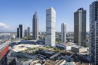 Photo of several skyscrapers against a blue sky