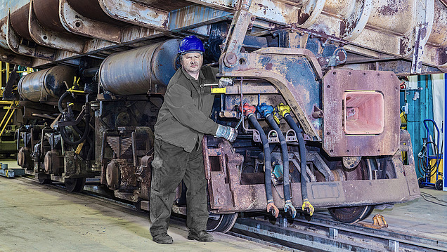 Picture of a man working on a train